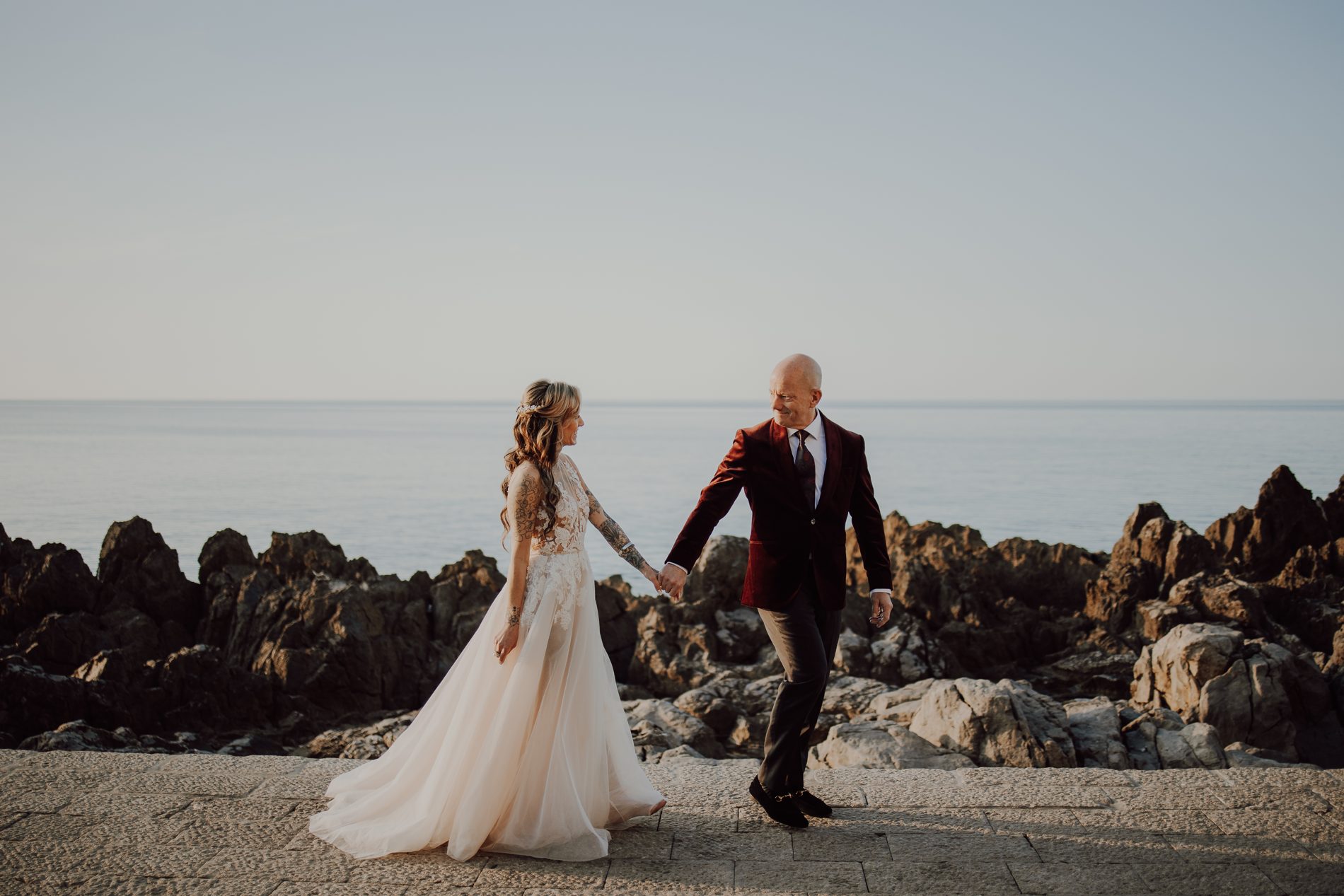 Hand in hand along the Cefalù shoreline