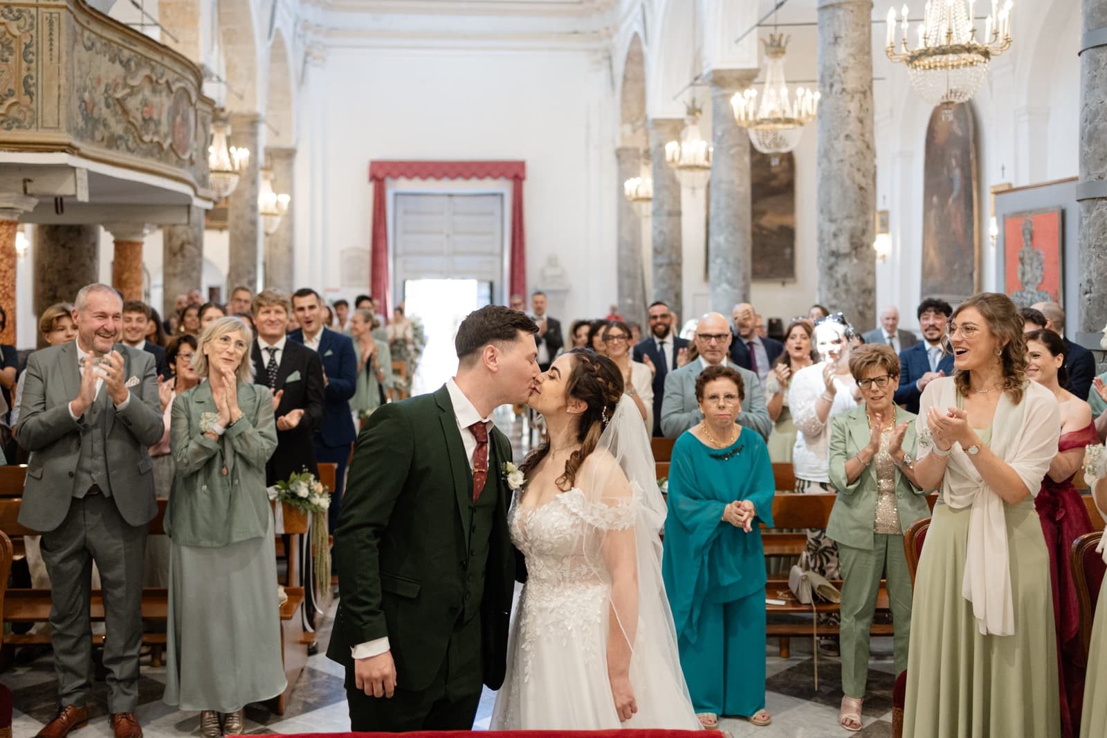 Ceremony kiss inside the church at Polizzi Generosa