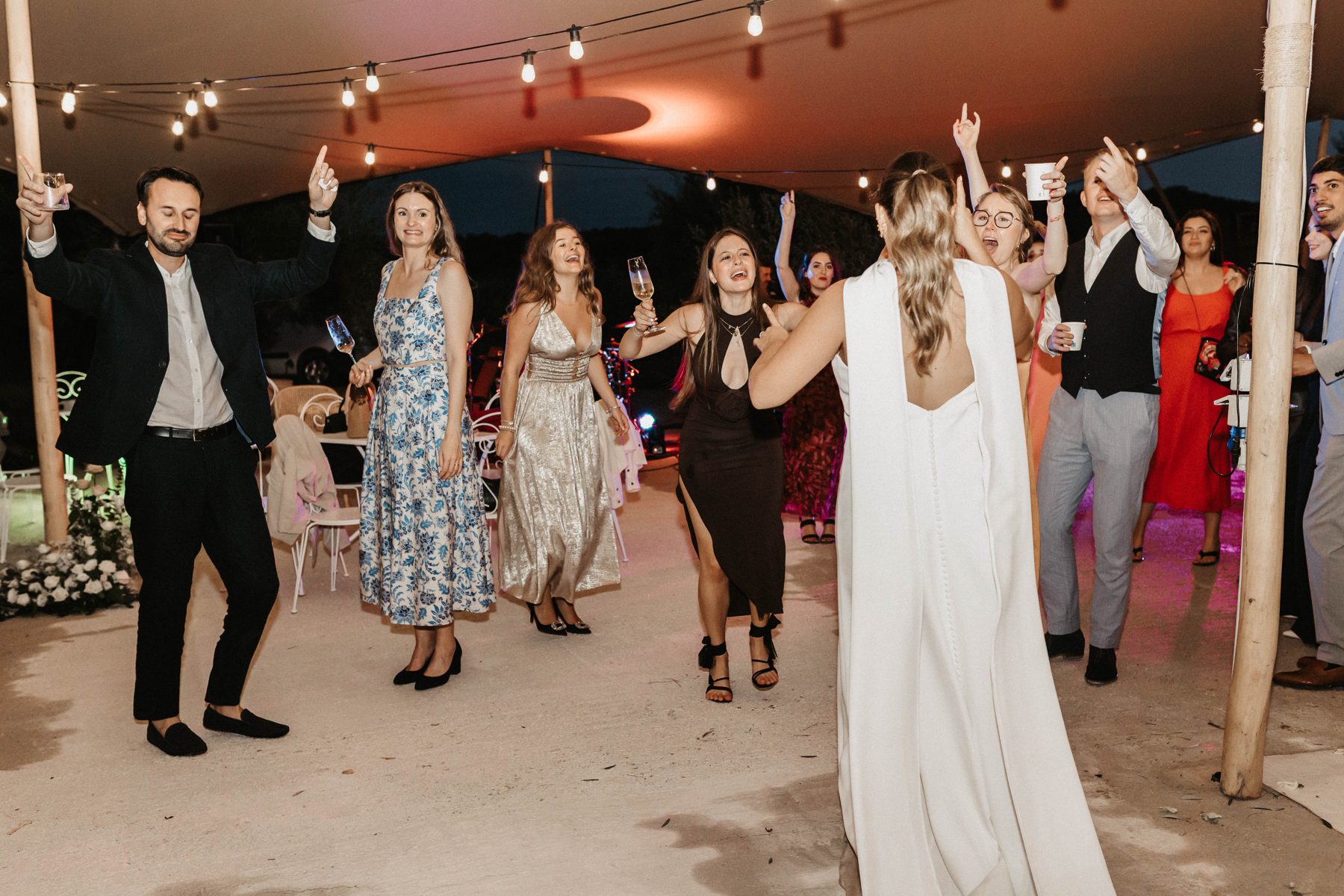 Dancing under the string lights after dark