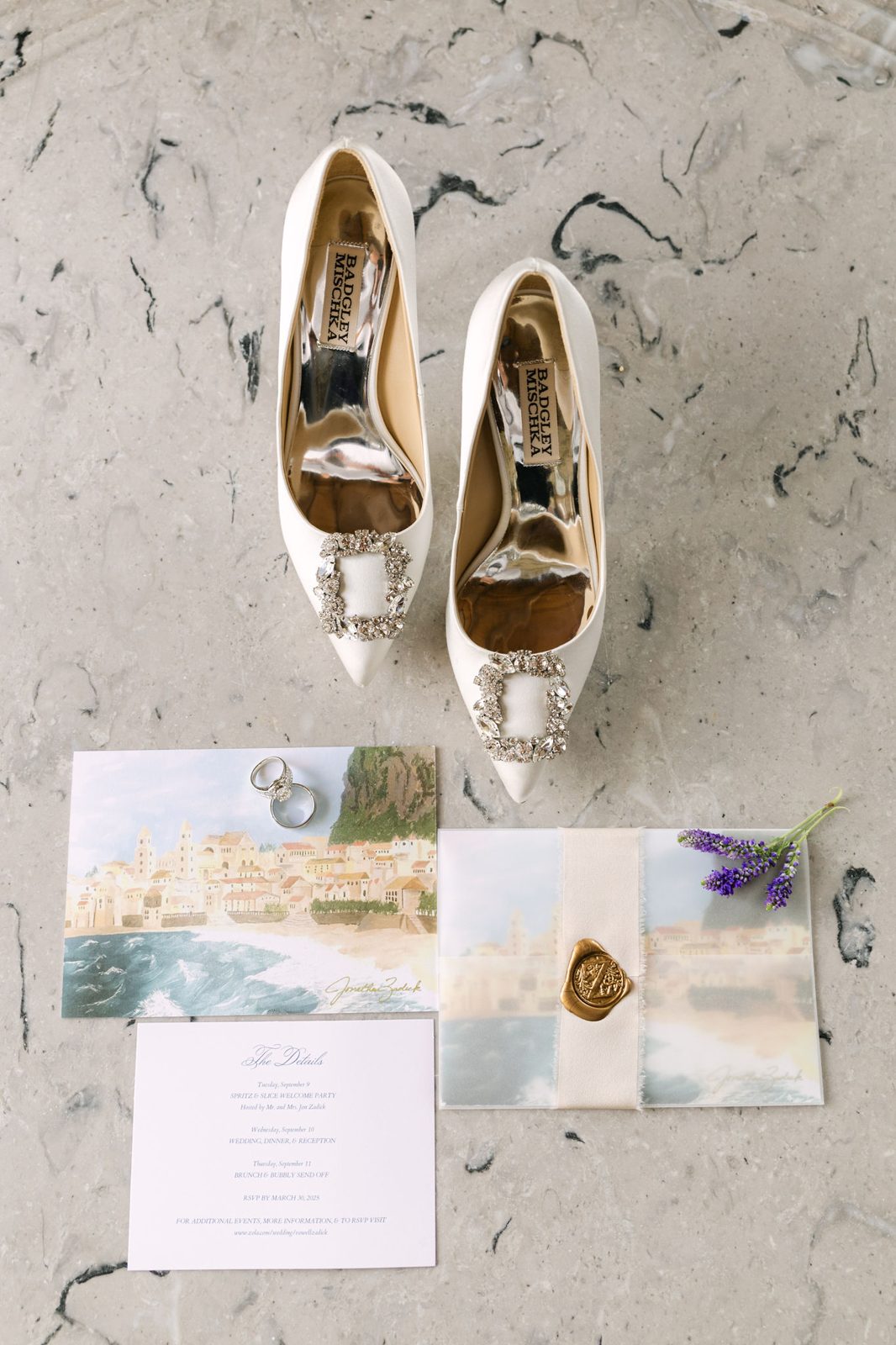 The morning's details — heels, rings and the hand-painted Cefalù invitation