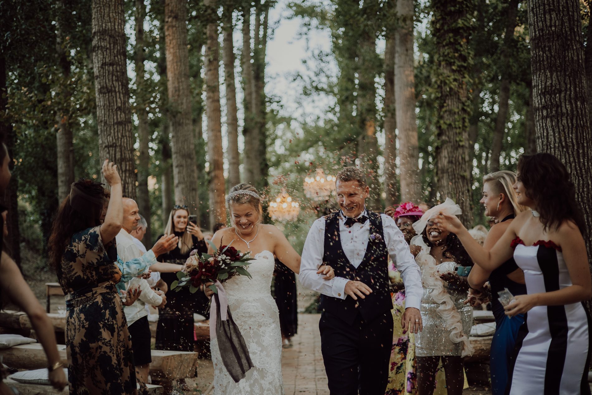 The recessional, through a shower of petals in the trees